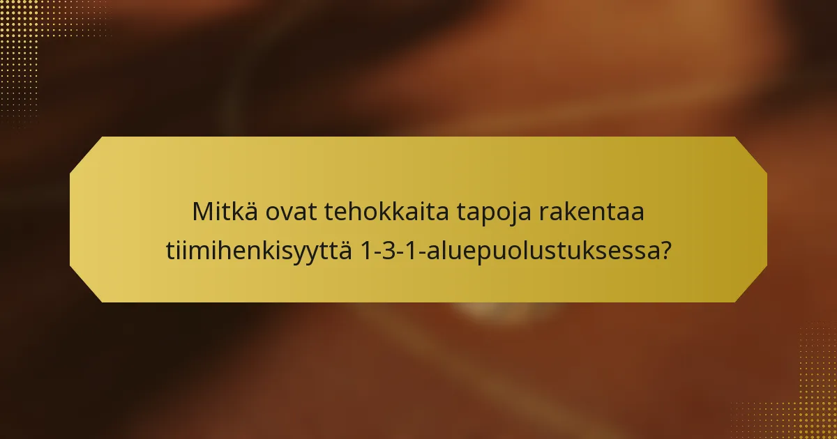 Mitkä ovat tehokkaita tapoja rakentaa tiimihenkisyyttä 1-3-1-aluepuolustuksessa?
